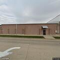 Person found unconscious at school becomes awake