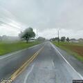 Horse-drawn buggy horse down in roadway