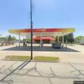 Semi backs into property at truck stop