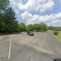 Abandoned car left in parking lot for a week