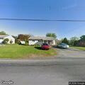 Car crashes into house and parked vehicle