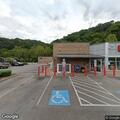 Dog left in car in shopping center parking lot