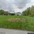 Brush fire in woods behind house on Route 56