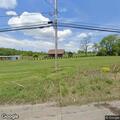 Car hits mailboxes and stops in field on Route 56