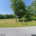 Person with headache at Pine Meadow Drive