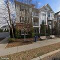 Fire crew checks carbon monoxide alarm in apartment