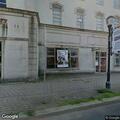 Police standby for low hanging wire on Main Street