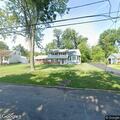 Tree limb hanging over roadway on Glen Road