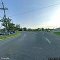 Officer responding to reported crash at traffic circle