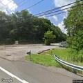 Tree blocking railroad tracks on Sample Road
