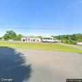 Female in 70s with breathing issues at industrial drive