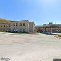 Woman having difficulty breathing at nursing home