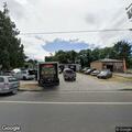 Diabetic woman sweating in vehicle at automotive shop