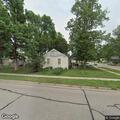 Person possibly locked in garage on N Williams Ave