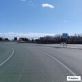 Disabled car on shoulder near Jones Beach tower