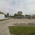 Officer checks person near Fair Park laundromat