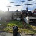 Car strikes house patio on Franklin Avenue