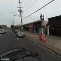 Person unwell on bench near Central Ave, Cedarhurst