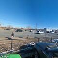 Car and bus crash in front of Costco in Lawrence