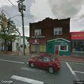 Person suffering anaphylaxis in front of restaurant on Broadway