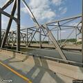 Pedestrian walking on shoulder of Shadeland Bridge