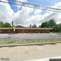 Car leaves road and hits tree near restaurant