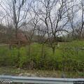 Brush fire in field on North Springboro Road