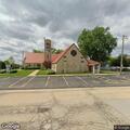 Man with arm laceration possibly fell in parking lot