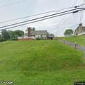 Report of low utility wire on Harding Avenue
