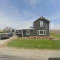 Vehicle fire spreads inside barn near propane tanks