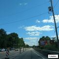 Disabled dump truck blocking right lane