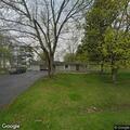 Delivery Driver Pinned Against Garage by Dogs