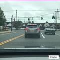 Suspicious vehicle flees parking lot near patrol car