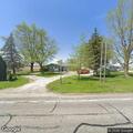 Driver hits mailbox and waits at nearby business