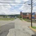 Traffic stop on dark green Jeep SUV on High Street