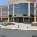 Person with chest pain at professional office building