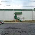 Two box trucks collide at store loading dock