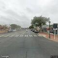 Person experiencing chest pains at bus stop in Amityville