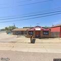 Woman with breathing trouble at bar in Bennett