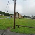 Person passed out in vehicle near football field