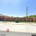 Driver harasses parent in school driveway