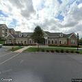 Group loitering by vehicles at apartment complex