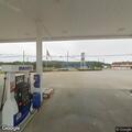 Welfare check on woman resting in car at store