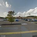 Confused man tries to enter gray car at Seven Fields store