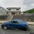 Garbage truck hits house and parked vehicles
