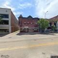 Group arguing near Neon Bison bar on Main Street