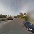 Vehicle stopped between lanes on Evergreen Street