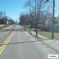 Blue liquid spilled across West Main roadway
