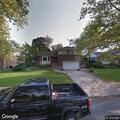 Electrical fire on utility pole behind home