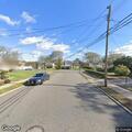 Person throwing trash on Butler Road in West Islip